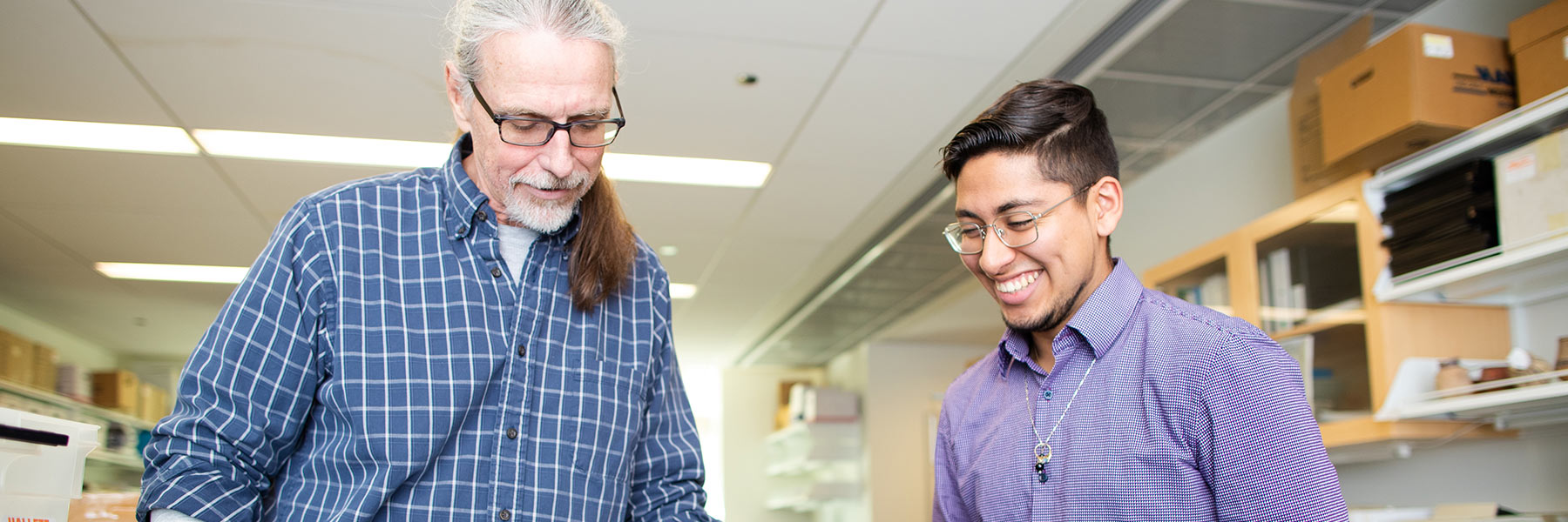 professor and student collaborate on project professor and student collaborate on project