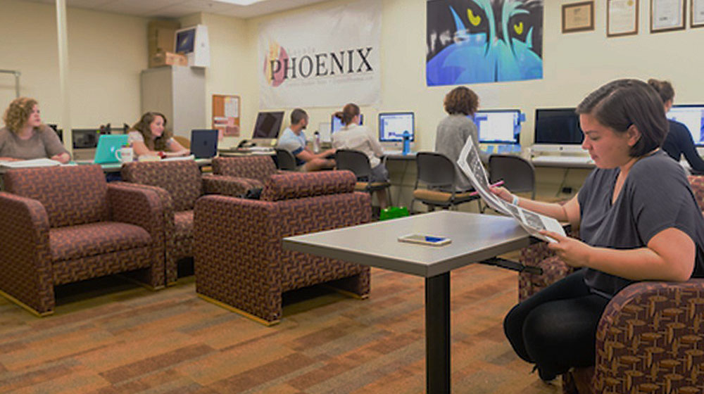 Loyola students work to complete the Loyola Phoenix before it goes to press