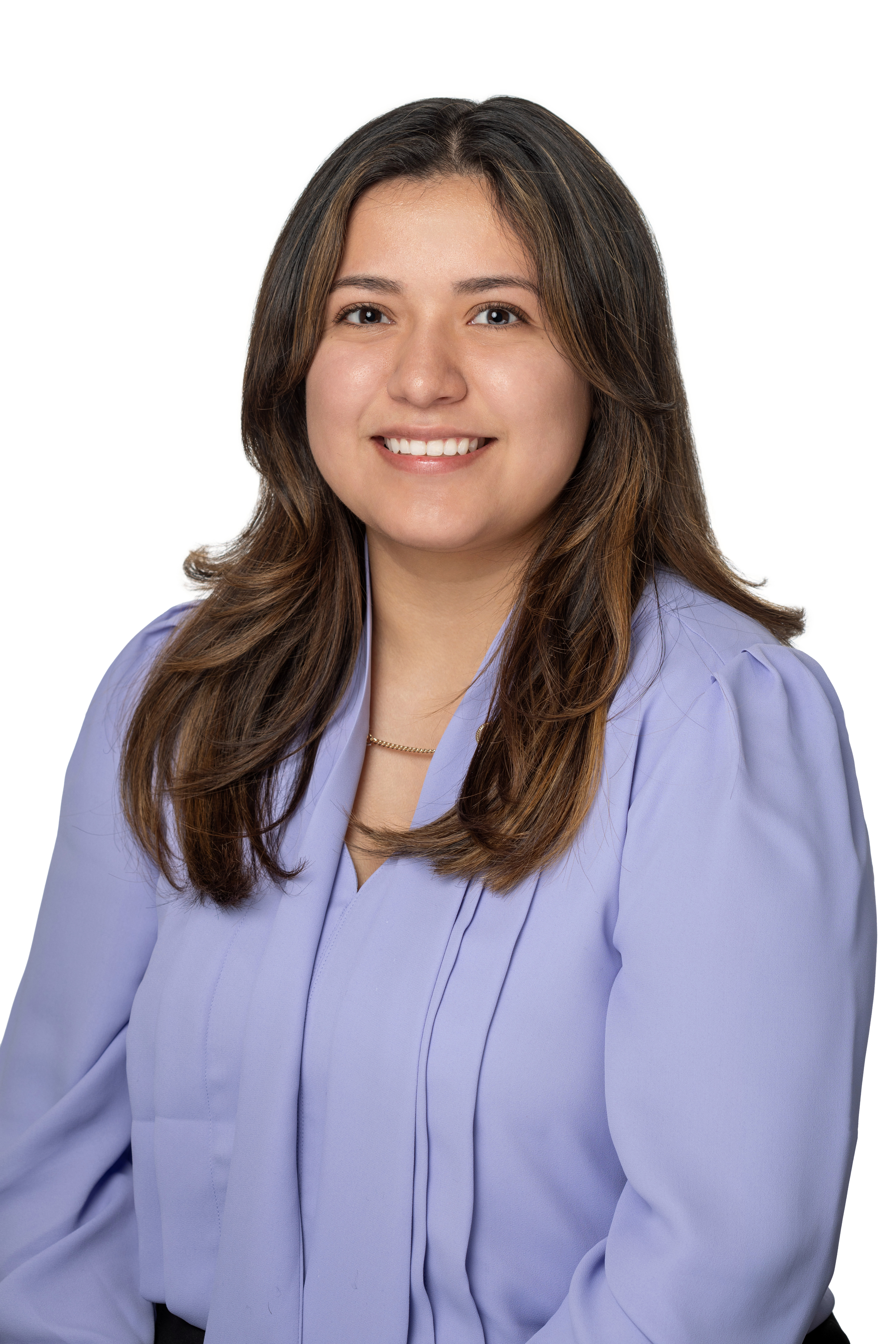 Karla Nazario, Academic Advisor, wearing a light purple blouse and smiling against a light background. Karla Nazario, Academic Advisor, wearing a light purple blouse and smiling against a light background.