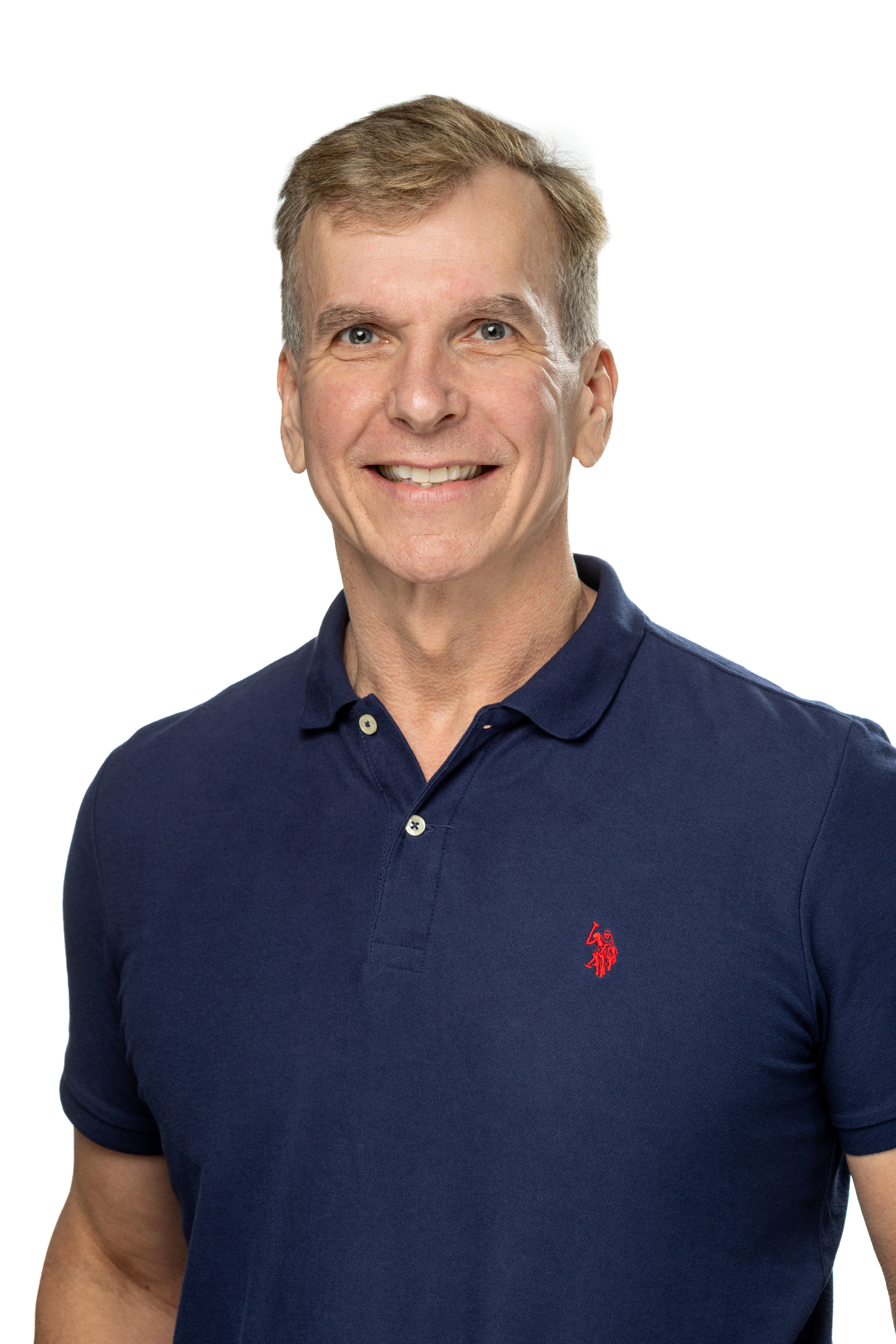 Portrait of John Orwat, PhD, Associate Dean for Faculty Development and Professor, smiling and wearing a navy polo shirt against a light background. Portrait of John Orwat, PhD, Associate Dean for Faculty Development and Professor, smiling and wearing a navy polo shirt against a light background.