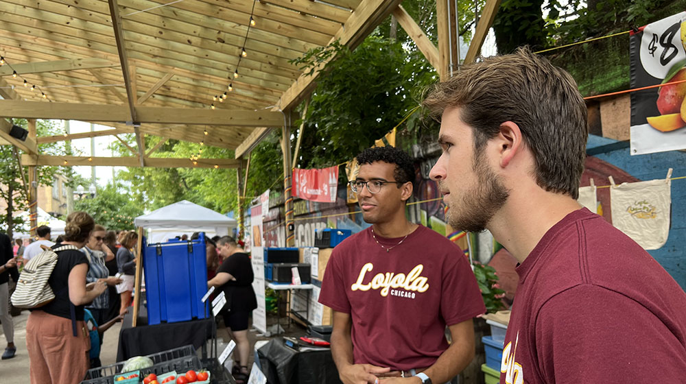 student workers at the farmers market