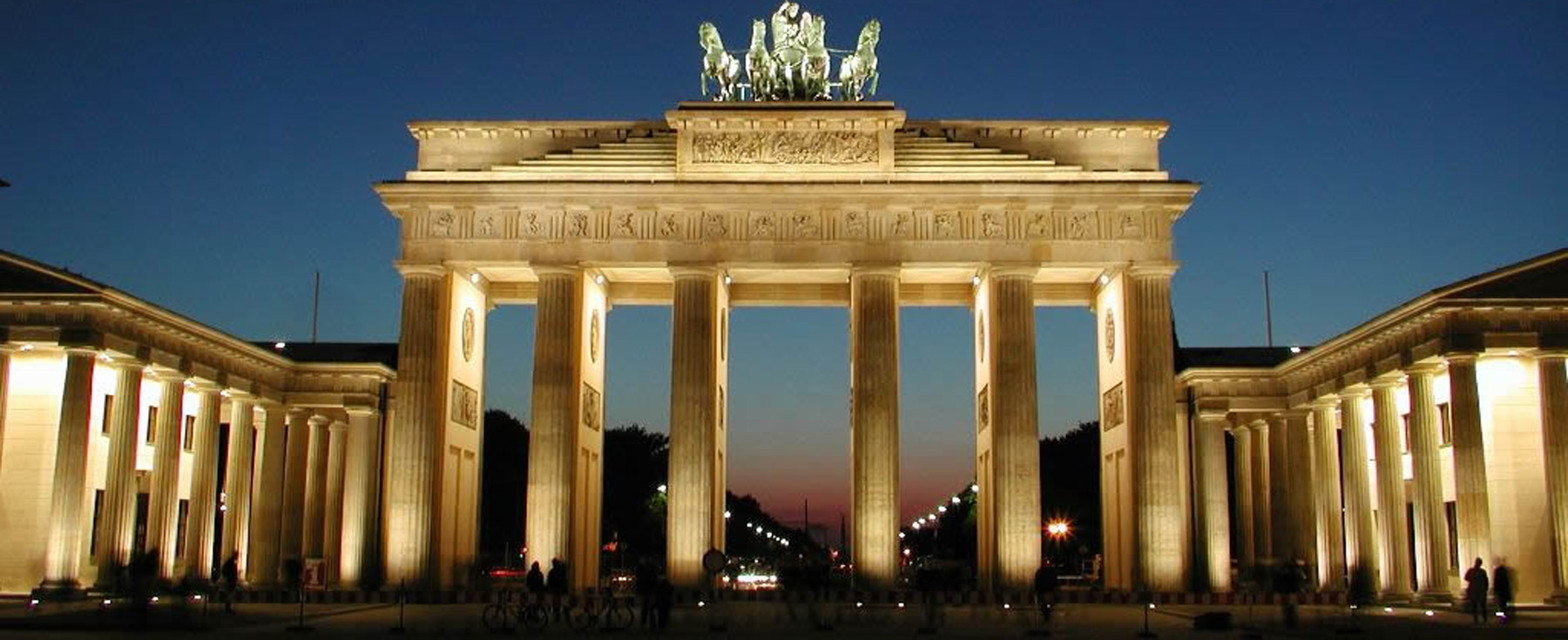 The Brandenburg Gate, lit up at night, in Berlin, Germany. This renowned landmark is a symbol of German reunification and is studied by German students at Loyola University Chicago. The Brandenburg Gate, lit up at night, in Berlin, Germany. This renowned landmark is a symbol of German reunification and is studied by German students at Loyola University Chicago.