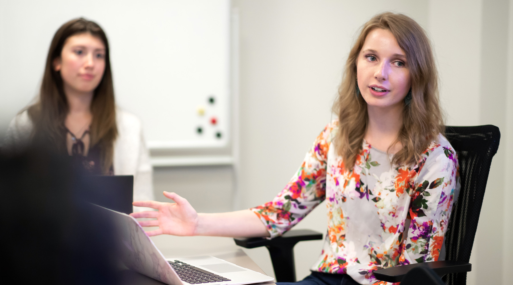 President's Medallion winner Emily Robertson participates in a leadership meeting at Inigo, a student-run marketing agency at Loyola University Chicago. (Photo: Lukas Keapproth)