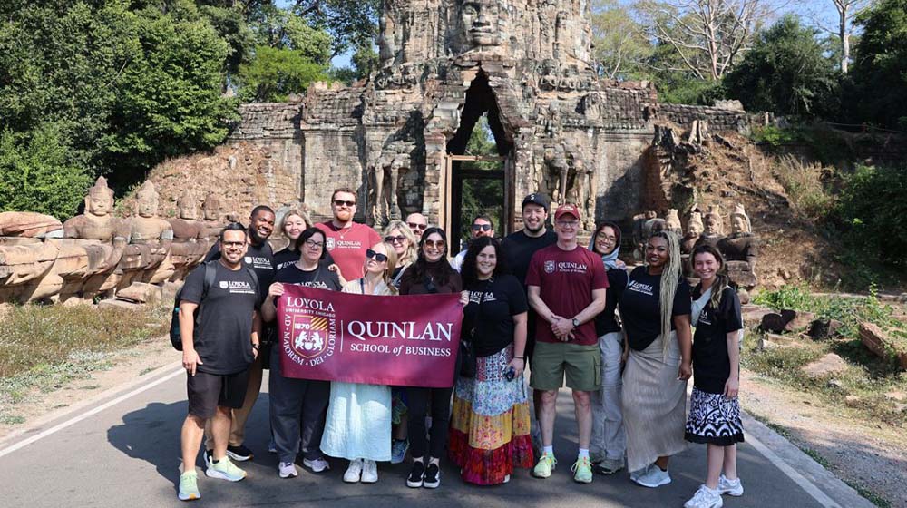 MARK 561 students in front of the Angkor Thom Temple in Cambodia.