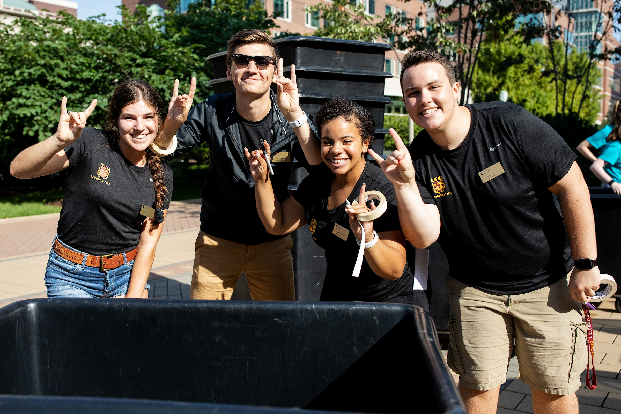 Four students smiling during the 2019 move in day