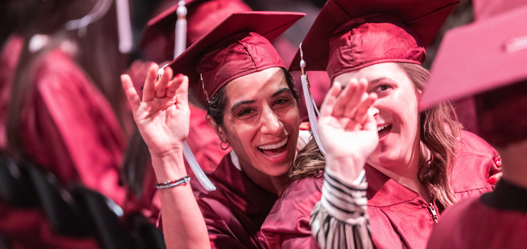 Loyola University Chicago graduates celebrate during commencement