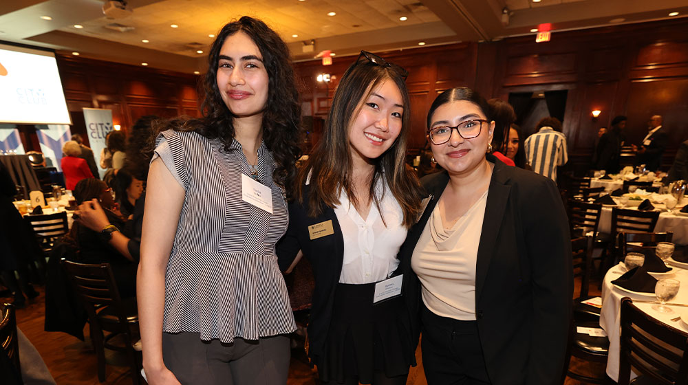 Students pose at the City Club.