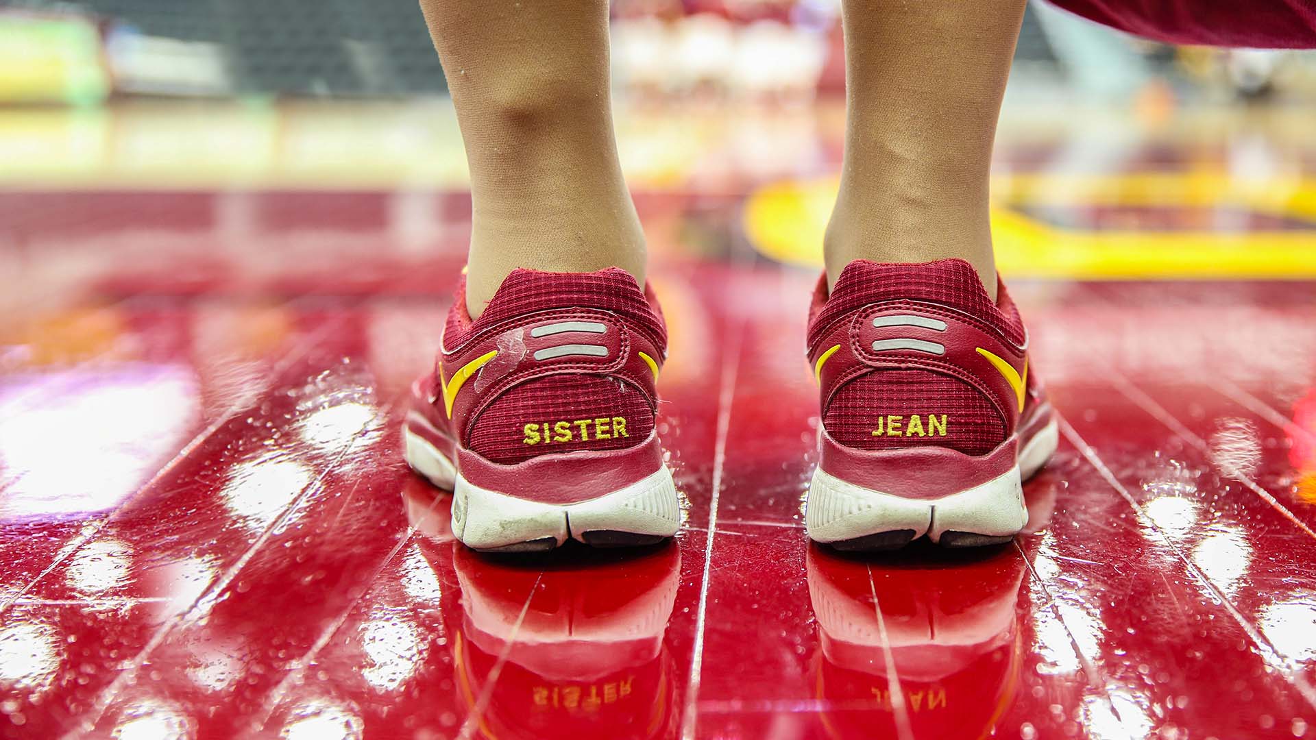  Sister Jean's wears her name stitched across the back of her shoes