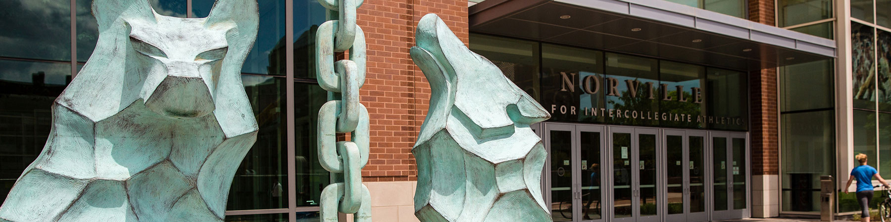 A sculpture on the Lake Shore Campus of Loyola University Chicago that depicts the story of the Ignatius family generosity that overflowed to the wolves that were starving.